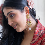 Statement earrings with deer figure and embellishments