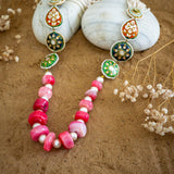 Statement necklace handcrafted with brass, kundan, pearls, enamel, and onyx slice tumbles