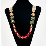 Statement necklace handcrafted with brass, kundan, pearls, enamel, and onyx slice tumbles