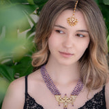 Statement necklace made with silver pendant and purple Amethyst beads