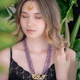 Statement necklace made with silver pendant and purple Amethyst beads