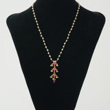Handcrafted neckpiece made using pearls, silver, kemp stones and red onyx