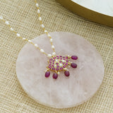 Unique necklace made with pearls, silver, kundan, kemp stones, and red onyx