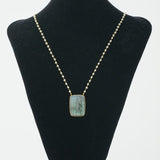Dainty neckpiece with a Labradorite gemstone pendant