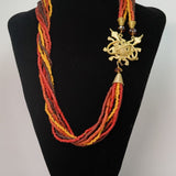 Turtle pendant with warm orange ceramic and corals beads (African Collection)