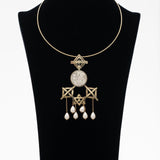 Statement necklace handcrafted with pearls and coin