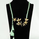 Spices Inspired Gold Plated pendant paired with green Satin rope (Ananya Collection)