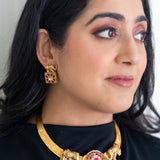 Handcrafted intricately designed hasli and earrings set