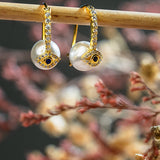 Pure silver evil eye earrings