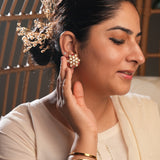 Signity glow Red and White Kundan Studded Shell Earrings
