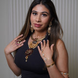Ruby Crescent Pearl Ring: pink-hued crescent ring adorned with pearls and gold detailing - Finger Ring Collection