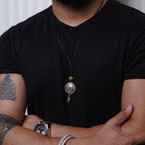 Leather chain with Devi pendant and african brass : Necklace
