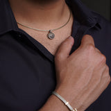 Silver and gold plated matt bracelet with jaguar embellishment