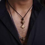 Black silk thread with african brass