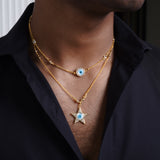 Evil eye in star shape in gold chain with swaroski stones