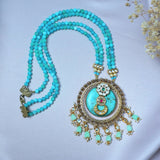 Stunning turquoise stone inlay studded with kundan