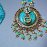 Stunning turquoise stone inlay studded with kundan