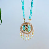 Stunning turquoise stone inlay studded with kundan