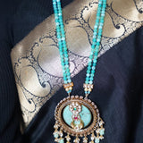 Stunning turquoise stone inlay studded with kundan