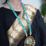 Stunning turquoise stone inlay studded with kundan