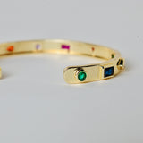 Gold plated bangle with multi color stones