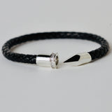 Black leather braided cuff with silver color embellishment