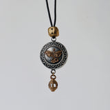 Leather chain with Devi pendant and african brass : Necklace