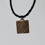 Leather chain with african brass pendant