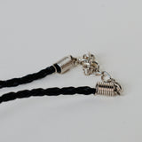 Black silk thread with african brass