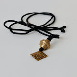 Blue cotton silk thread with brass pendant