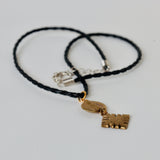 Leather chain with african brass pendant
