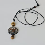 Leather chain with Devi pendant and african brass : Necklace