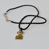 Black silk thread with african brass