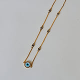 Evil eye cirlce in gold chain with swaroski stones