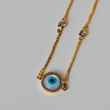 Evil eye cirlce in gold chain with swaroski stones