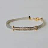 silver Bracelet with gold and swaroski stones embedded