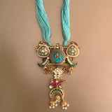 Himalayan Serenity: Sky Blue Thread Necklace with Tibetan Pendant & Jewel-Adorned Jhumki Drops" - Isaana Collection
