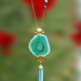 A stunning aqua green agate pendant