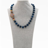 Signature beaded necklace with Tibetan side pendant and blue crystals