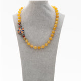 Signature beaded necklace with Tibetan Side pendant and Yellow beads