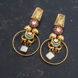 Statement earrings with deer figure and embellishments