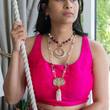 Beautifully handcrafted temple jewelry pendant set in 1 gm gold foaming case strung with shell pearls and colored Duldul beads