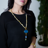 A stunning turquoise agate pendant in a beaded Long Chain