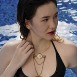Artistic neckpiece handcrafted with coin