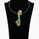 Asymmetric coin necklace
