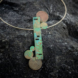 Asymmetric coin necklace