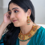 Gold plated kashi mala necklace emebellished with coral and green onyx
