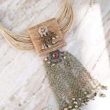 Jute necklace paired with a long Afghani pendant