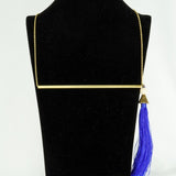 Gold plated neckpiece with a blue satin tassel (Ananya Collection)