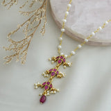 Handcrafted neckpiece made using pearls, silver, kemp stones and red onyx